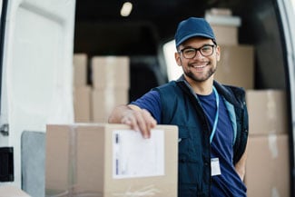 moving crew member unpacking truck
